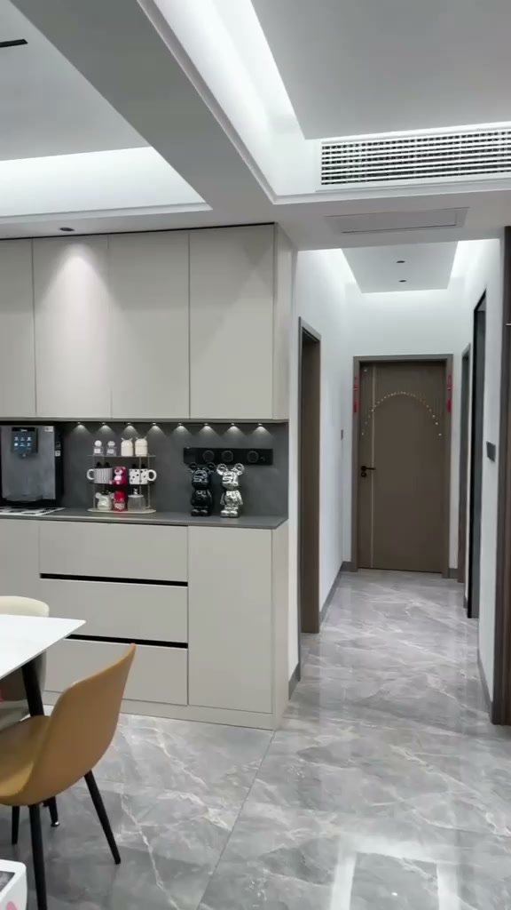 Kitchen cabinetry and breakfast counter from the Aanganshobha portfolio